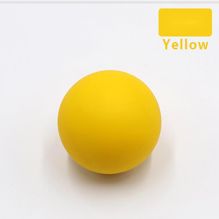 Silicone single ball Fascia ball massage ball in bright yellow color for health massage and fitness.