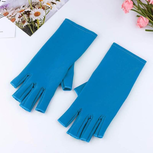 Manicure UV Protection Glove in vibrant blue color, half-finger design for stylish nail care.