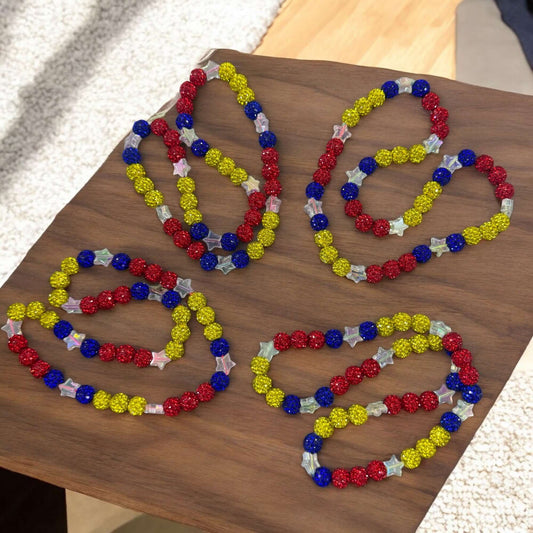 Venezuelan Spirit Necklace - 16" Unisex Baseball colorful rhinestone necklaces displayed on a wooden surface.