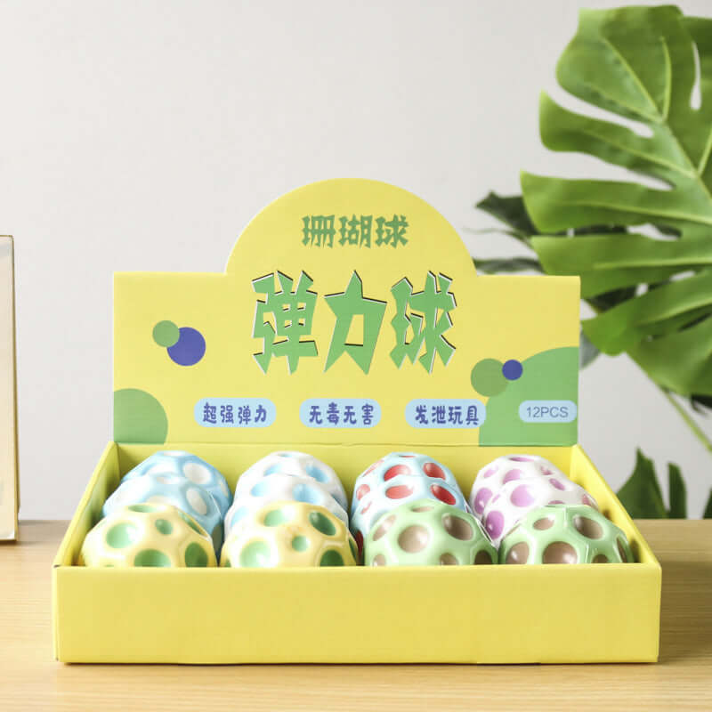 Bouncy Ball Toy Ball display in colorful packaging, featuring twelve PU polyurethane balls on a bright yellow box.