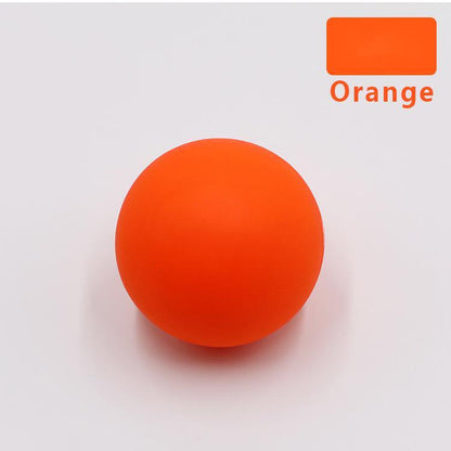Silicone single ball Fascia ball massage ball in orange color on a white background.