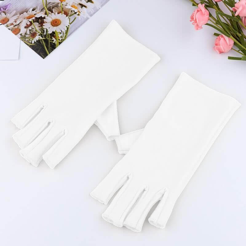 Manicure UV Protection Glove displayed on a table, perfect for nail care and stylish protection.