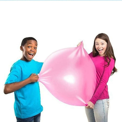 Big Inflatable Ball Children's Toy Elastic Ball Water Ball Bubble Ball Inflatable Ball held by kids in bright clothing.